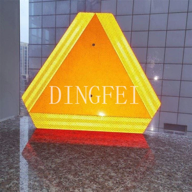 Orange Triangle Sign On Vehicle